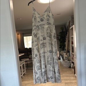 Elegant Cream Maxi Dress with Black Print